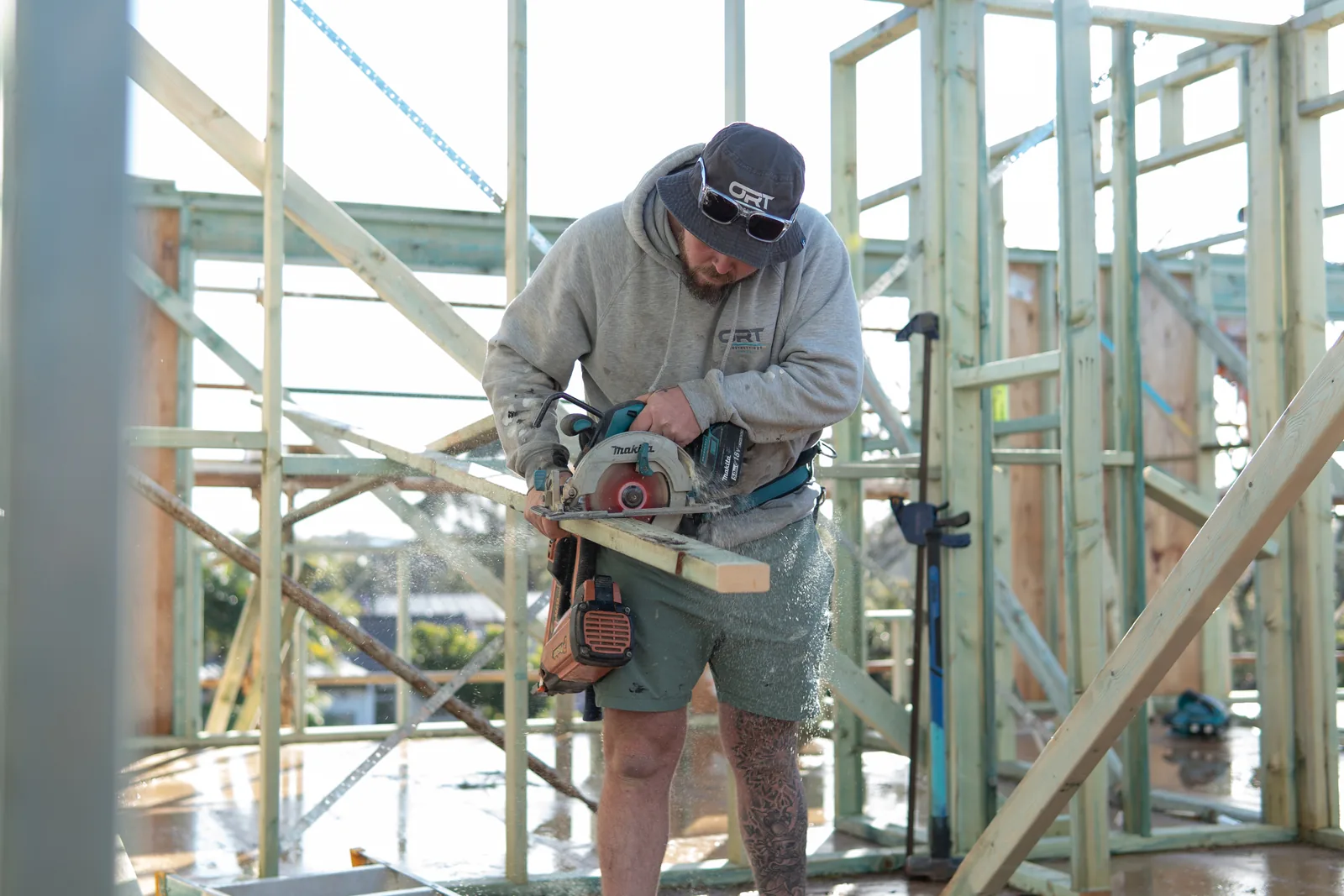 Carpenter cutting timber on a Sydney construction site